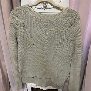 A grey sweater